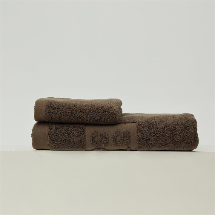 Luxury cotton terry towel set with logo border and extra soft Turquetto structure