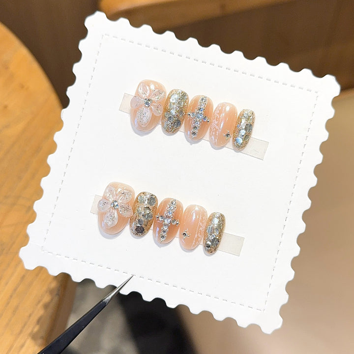 Glamorous artificial nails with floral and glittering accents Stornfield