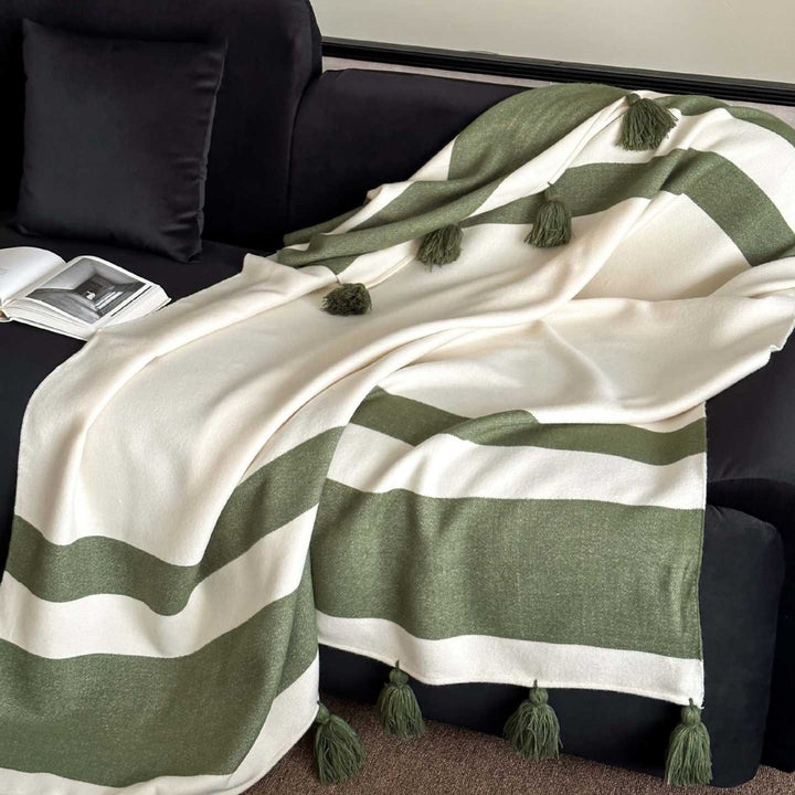 Throw blanket with tassels and wide stripe pattern