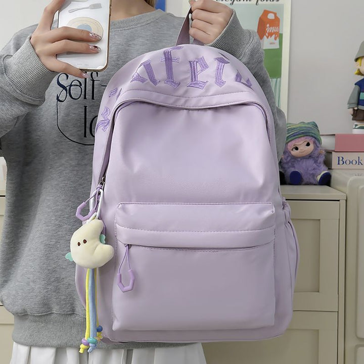 Fashionable backpack with removable charms Stornfield