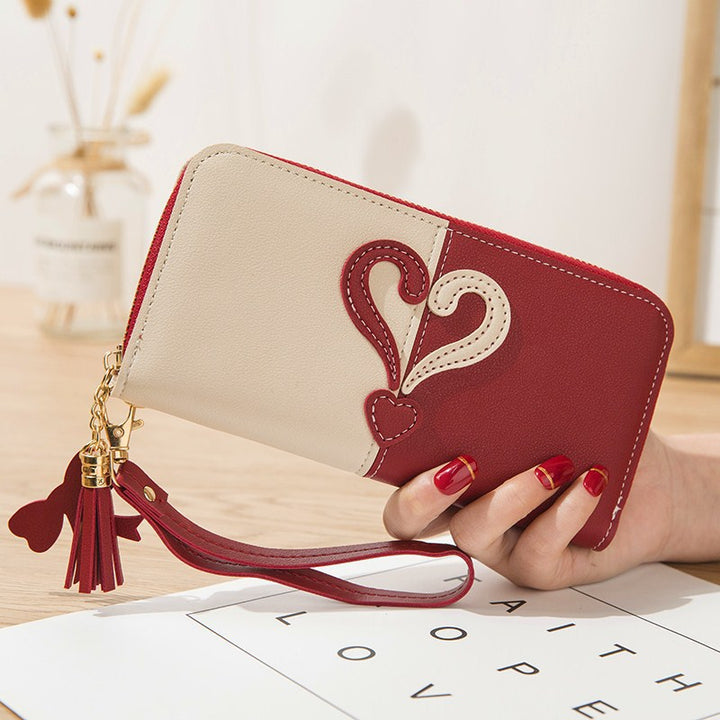 Stylish wallet with heart appliqués Stornfield