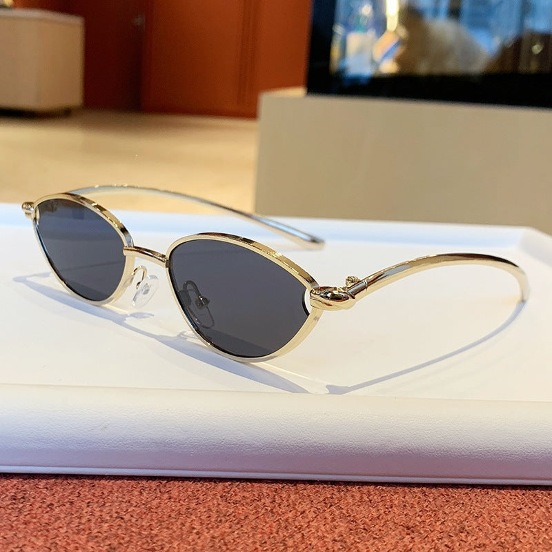 Women's designer sunglasses with elegant metal frame and protective lenses Stornfield