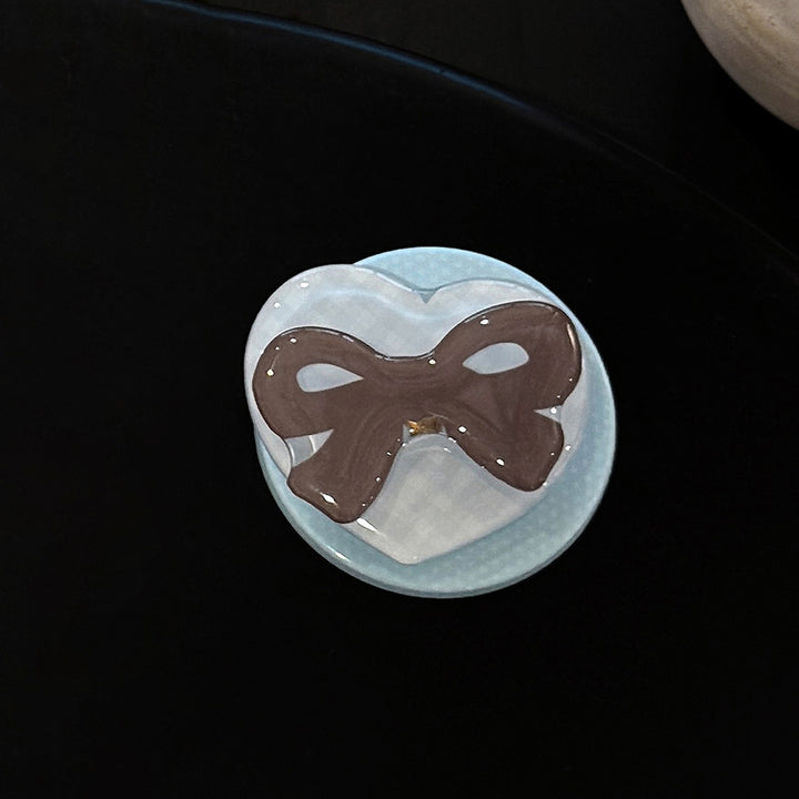 Decorative ceramic coaster with bow motif Stornfield