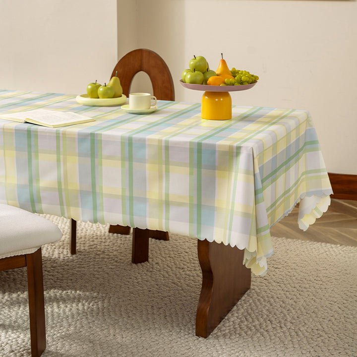 Wipeable tablecloth with star pattern and wavy hem Stornfield
