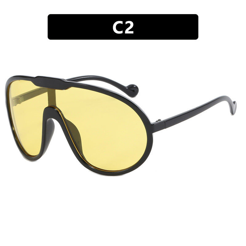 Women’s sporty sunglasses with wide frame and yellow lenses Stornfield