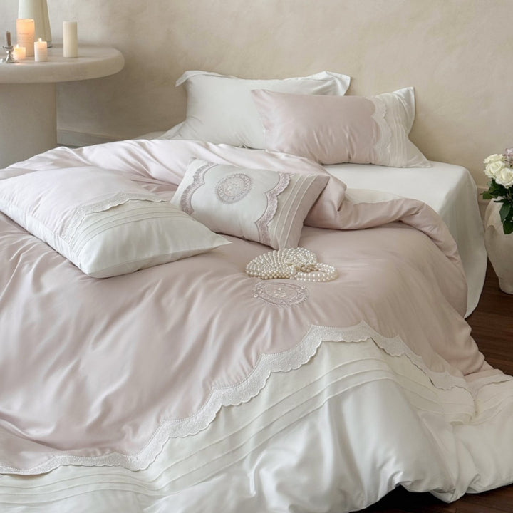 High-quality bedding set made of cotton satin with fine lace trim and embroidered medallion decorative cushions
