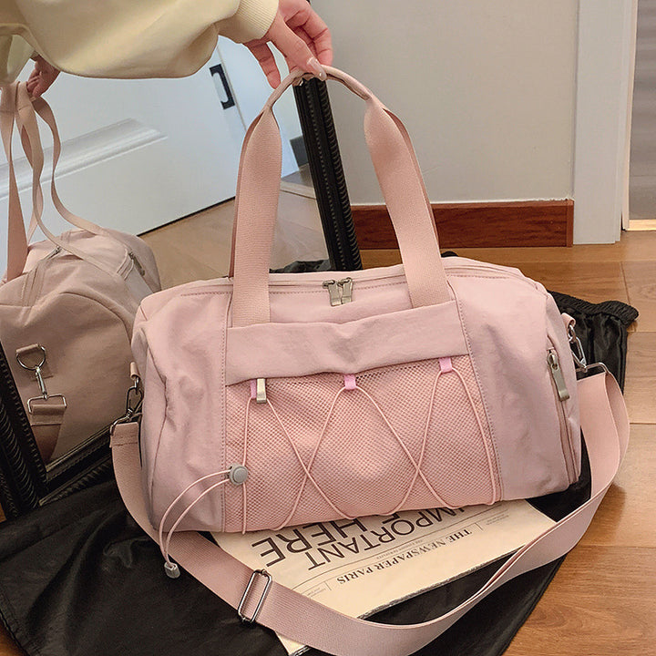 Sporty shoulder bag with adjustable carrying handles and breathable mesh material Stornfield