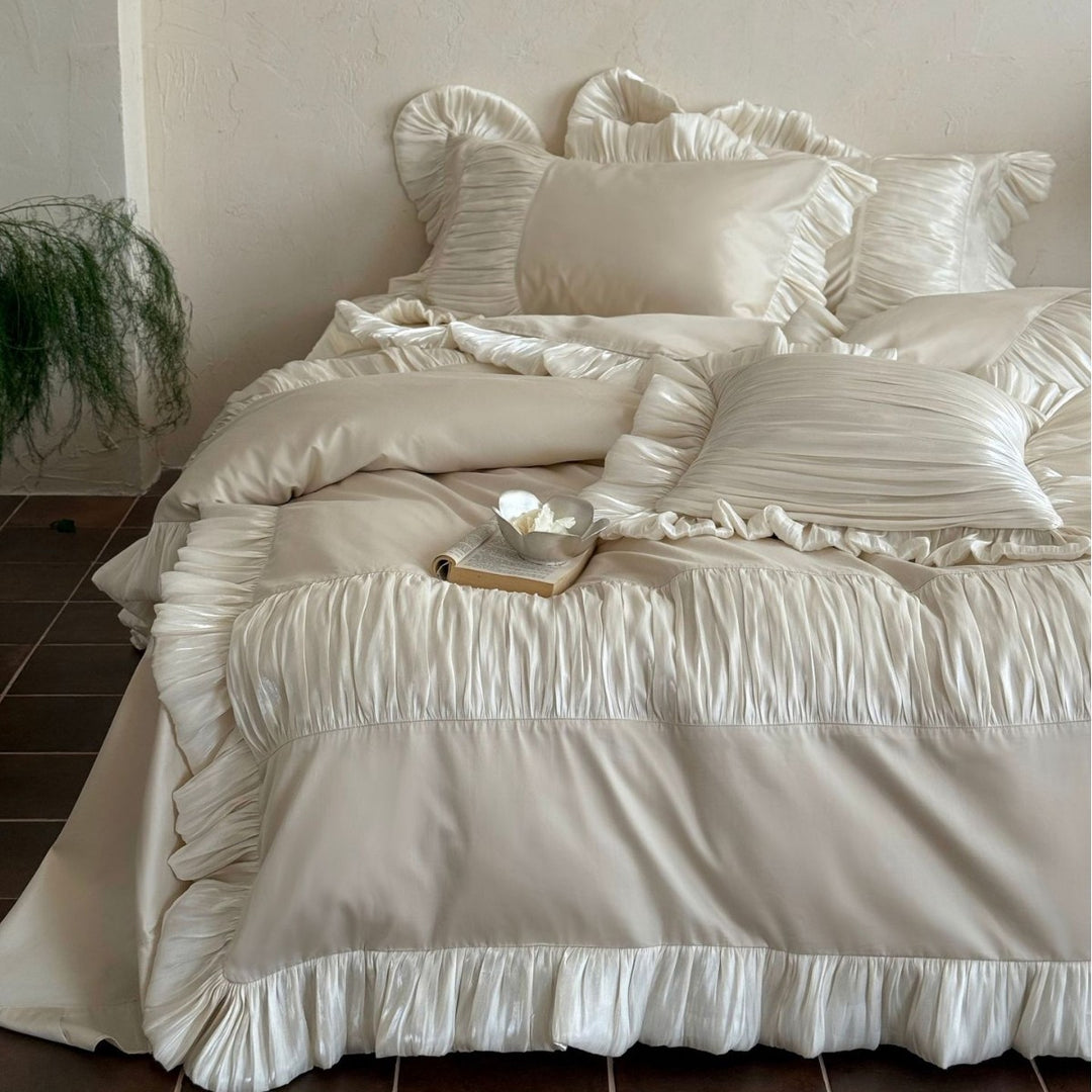Romantic satin bedding set with ruffles and pleated inserts