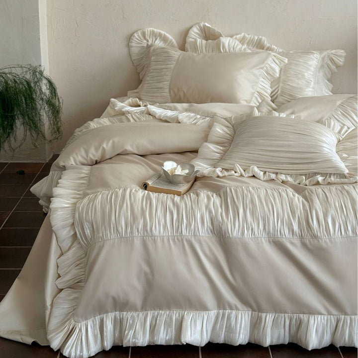 Romantic satin bedding set with ruffles and pleated inserts