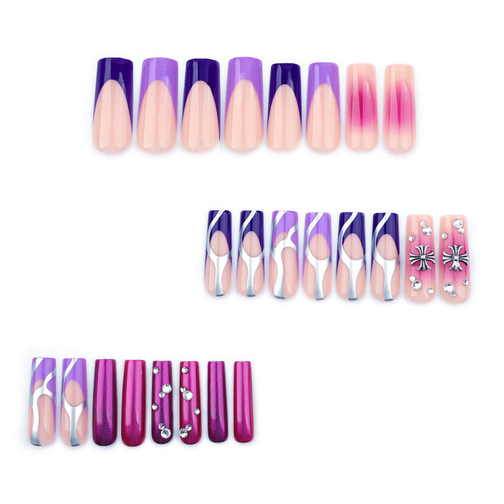 Artistic nail extensions with glitter and flower motifs Stornfield
