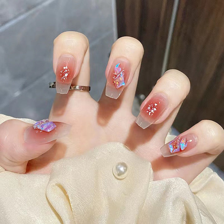 Artistic acrylic nails with glitter elements Stornfield