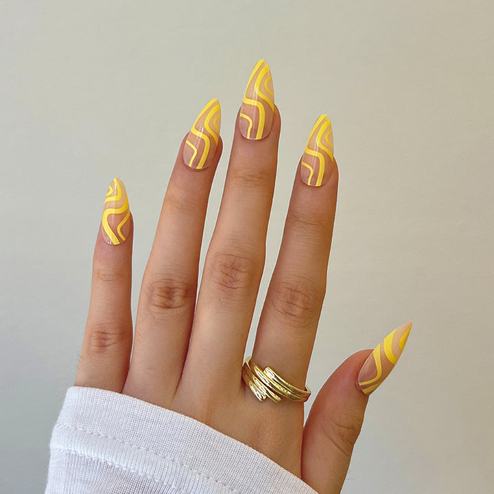 Artful nail extensions with an elegant leaf pattern Stornfield