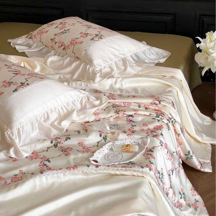 Noble satin bedding set with floral all-over print and ruffled pillow