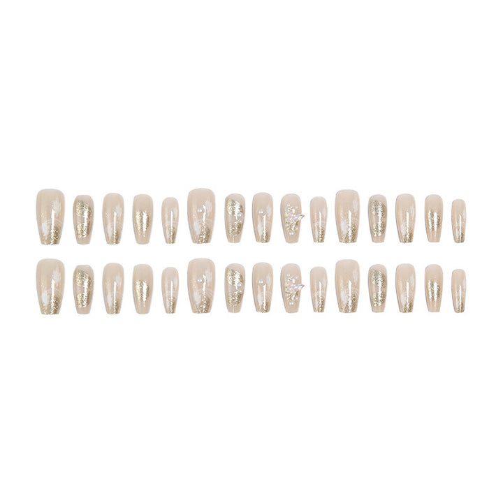 Glamorous artificial nails with heart-shaped accents Stornfield