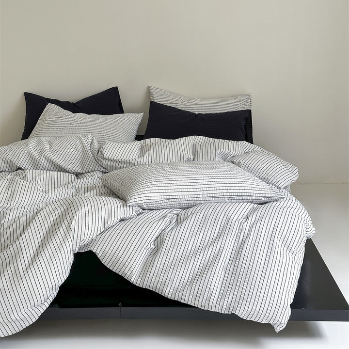 Noble bed linen set made of cotton percale with fine pinstripe structure and hotel closure