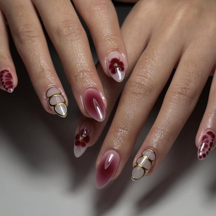Elegant Nail Art with Floral Design and Glitter Accents Stornfield