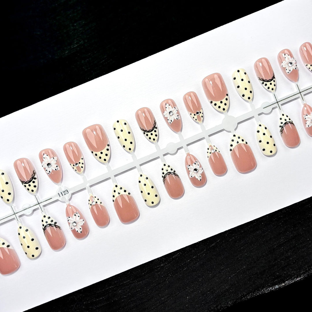 Elegant Press-On Nail Art Set with Floral and Dot Designs
