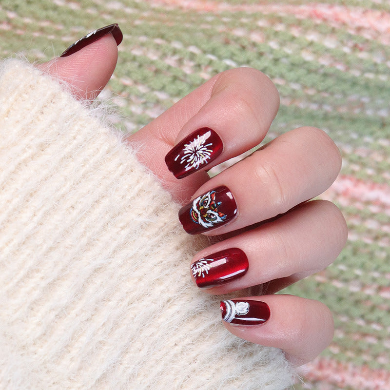 Artistic Holiday-Themed Press-On Nail Design Stornfield