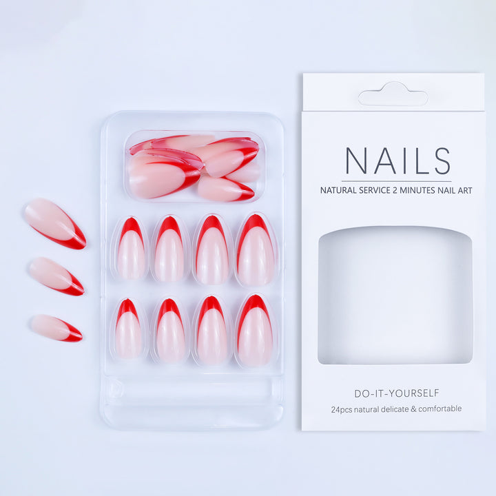 Artificial nails in stylish stiletto design with eye-catching top coat Stornfield