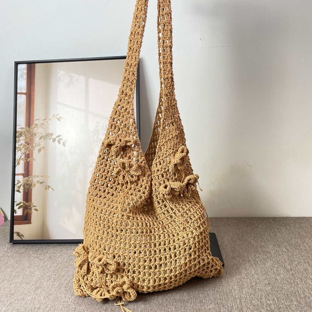Hand-knotted crossbody bag with floral pattern Stornfield