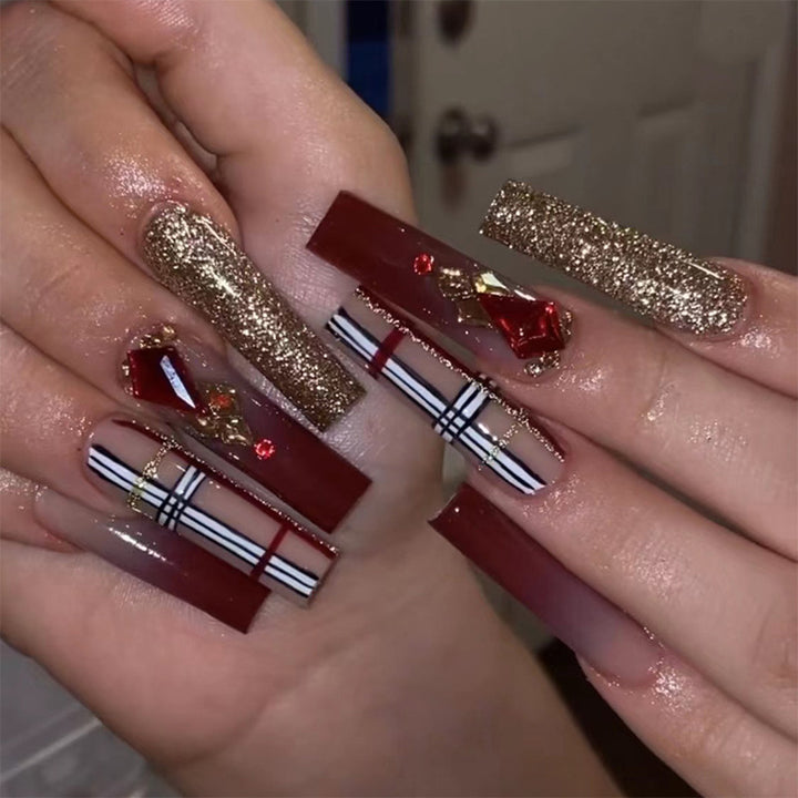 Glamorous stiletto nails with extravagant design and glitter accents Stornfield