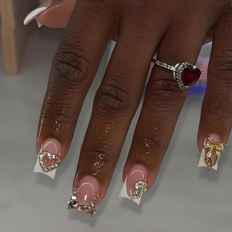 Artificial nail set with elegant jewelry and glitter elements Stornfield