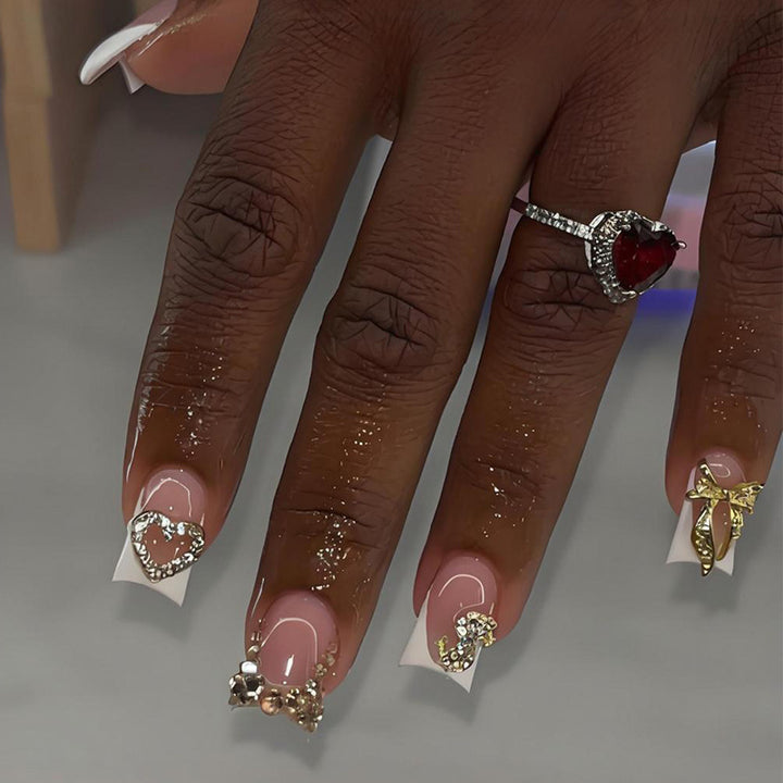 Artificial nail set with elegant jewelry and glitter elements Stornfield