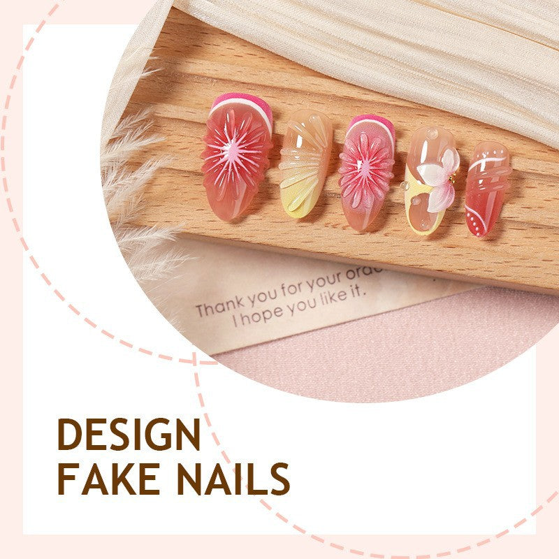 Artificial nail set with elegant floral details and glitter effects Stornfield