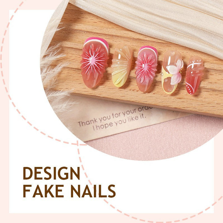 Artificial nail set with elegant floral details and glitter effects Stornfield