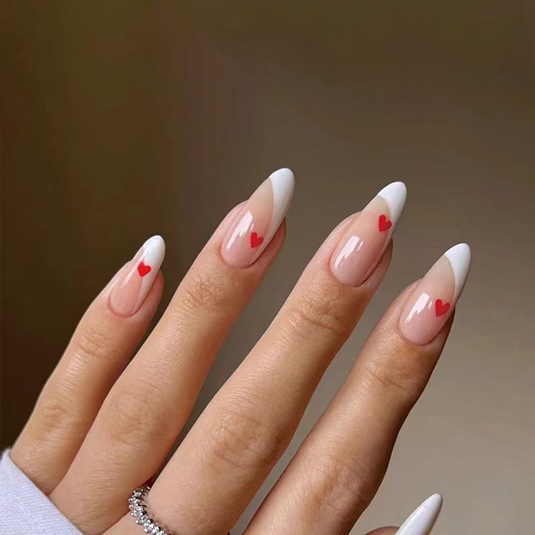 Elegant French Tip Press-On Nails with Heart Accents Stornfield