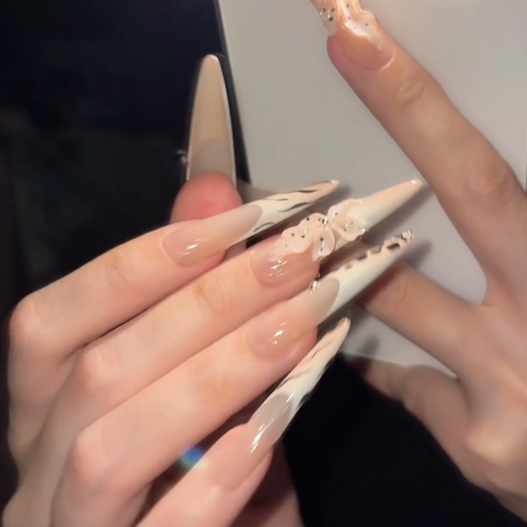 Elegant artificial nails with flower and animal design Stornfield