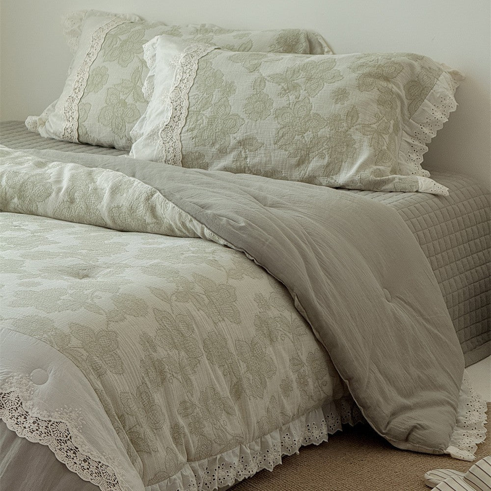 Vintage cotton bedding set with lace trim and hand-drawn floral pattern