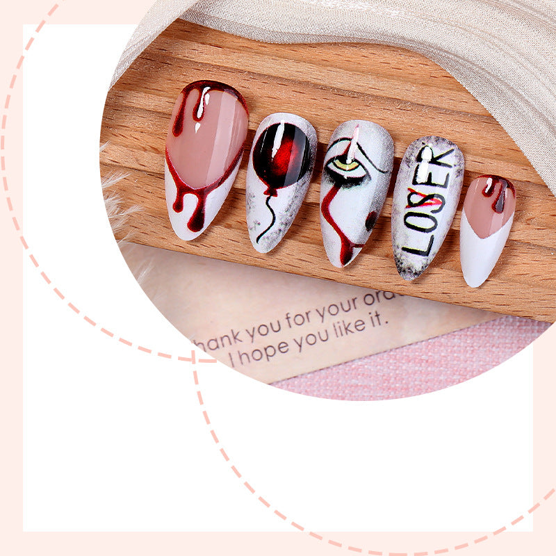 Creative nail art set with bloody and spooky designs Stornfield