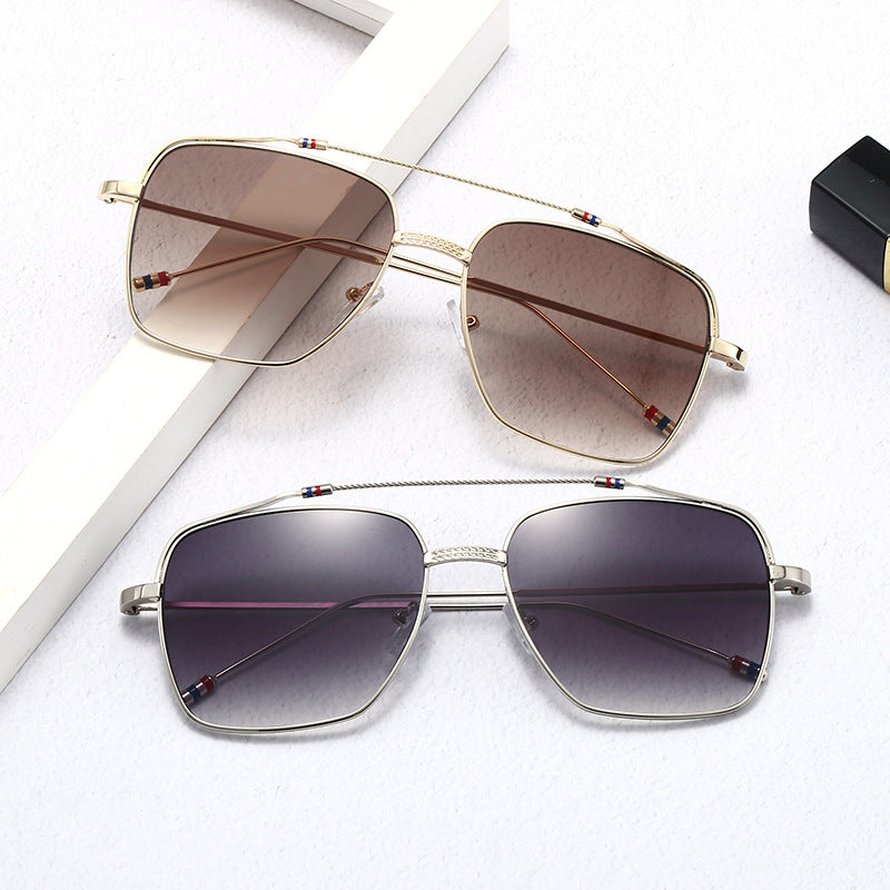 Ladies trendy curved glasses with narrow metal frame Stornfield
