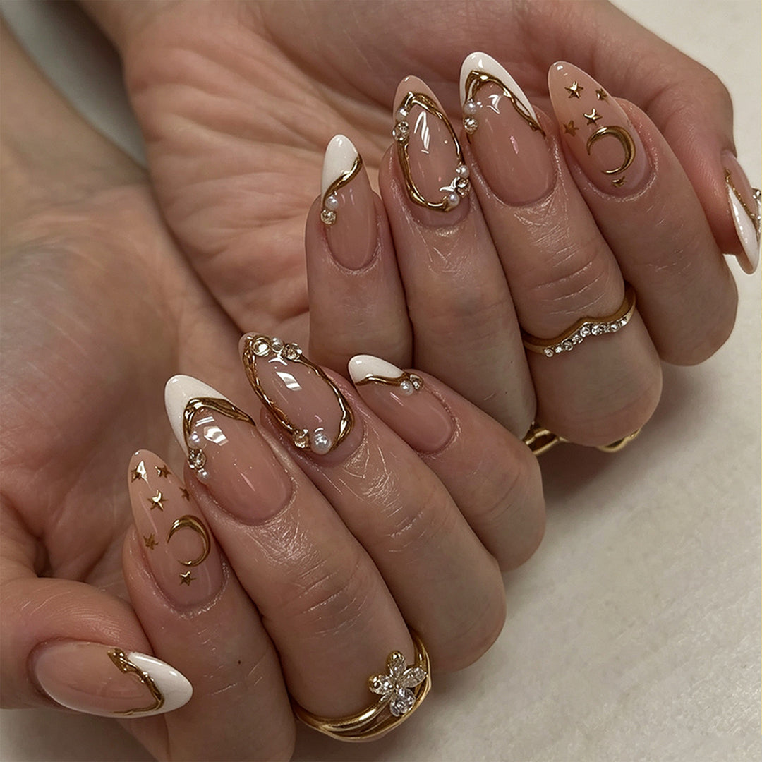 Elegant Nail Art with Glitter and Moon Designs Stornfield