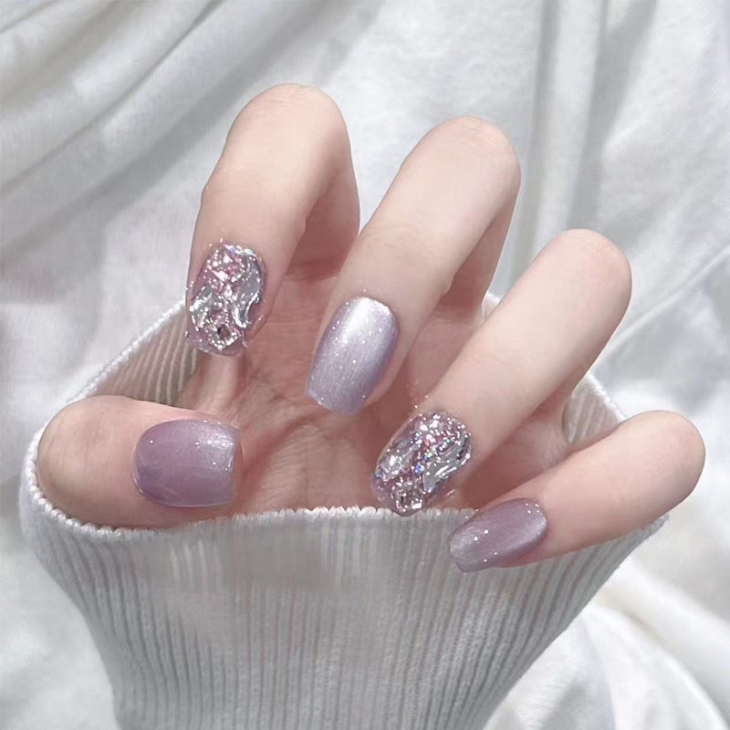 Artificial nail set with glitter and metallic effects Stornfield
