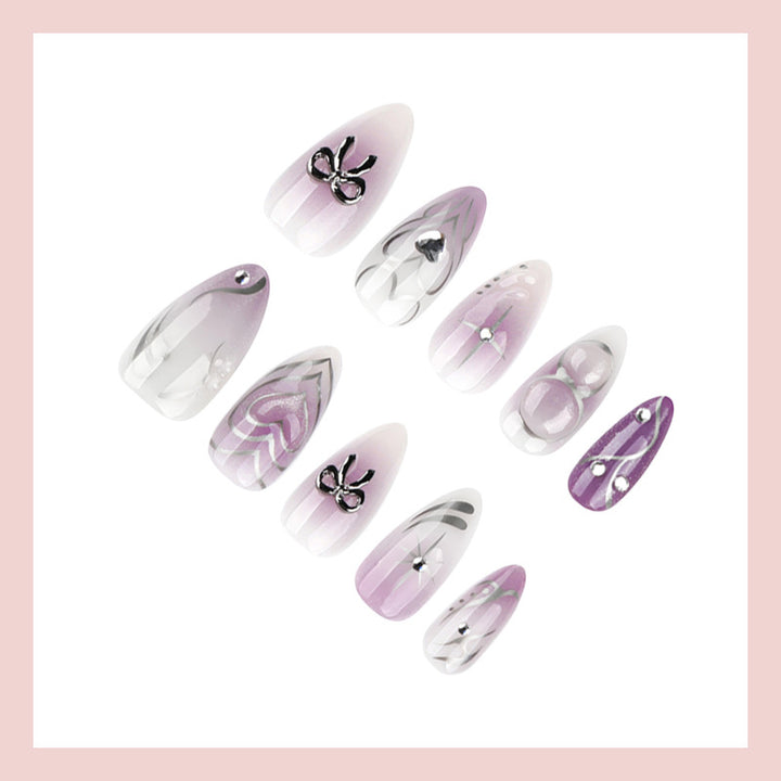 Nail art set with elegant flower and glitter accents Stornfield