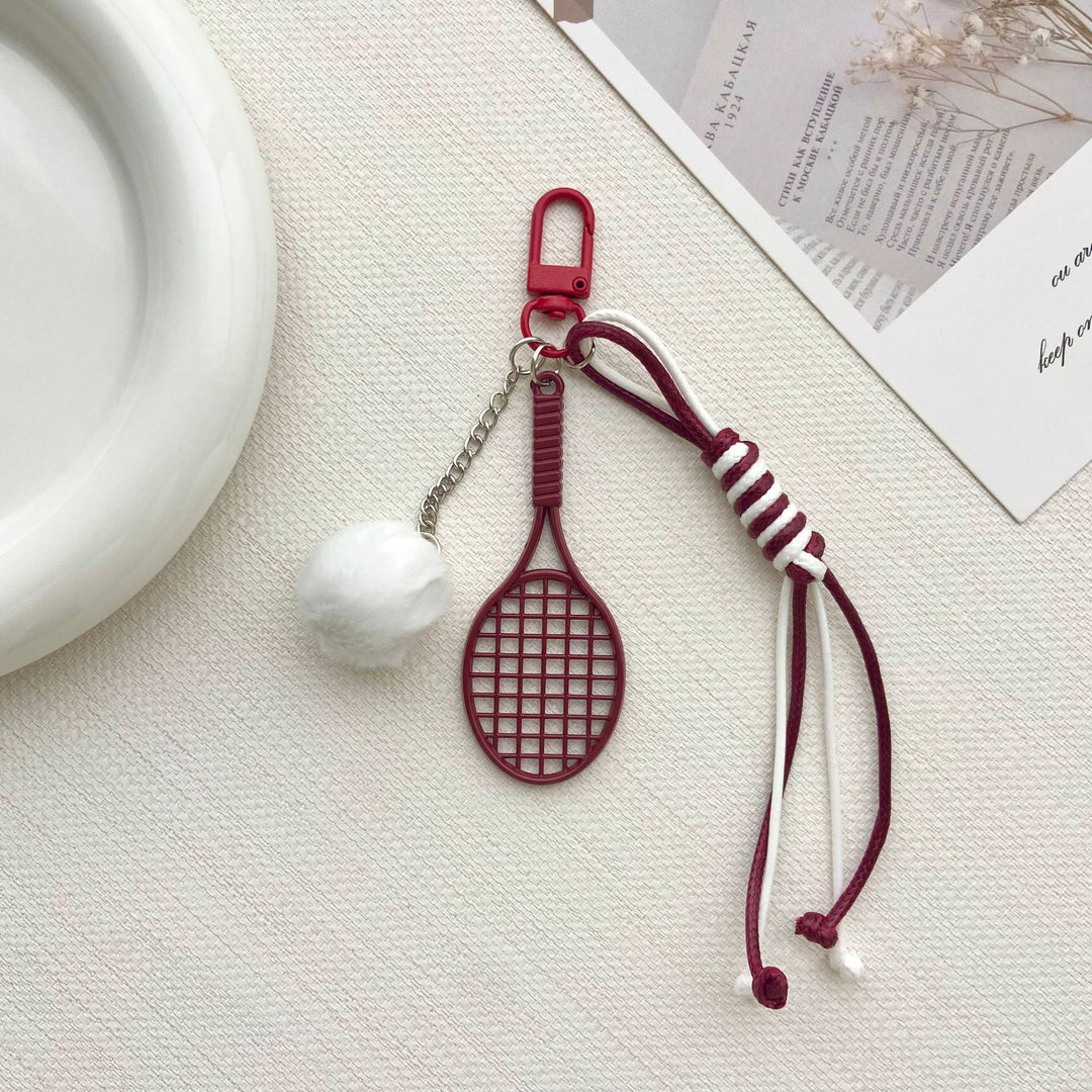 Tennis Racket and Fur Ball Keychain Stornfield