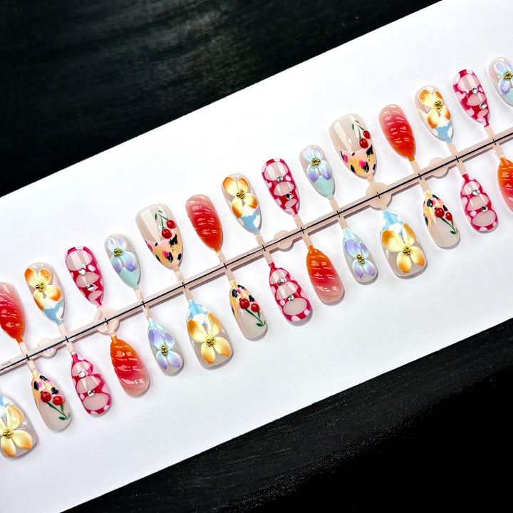 Artistic Press-On Nail Set with Floral and Gem Accents 1790746017