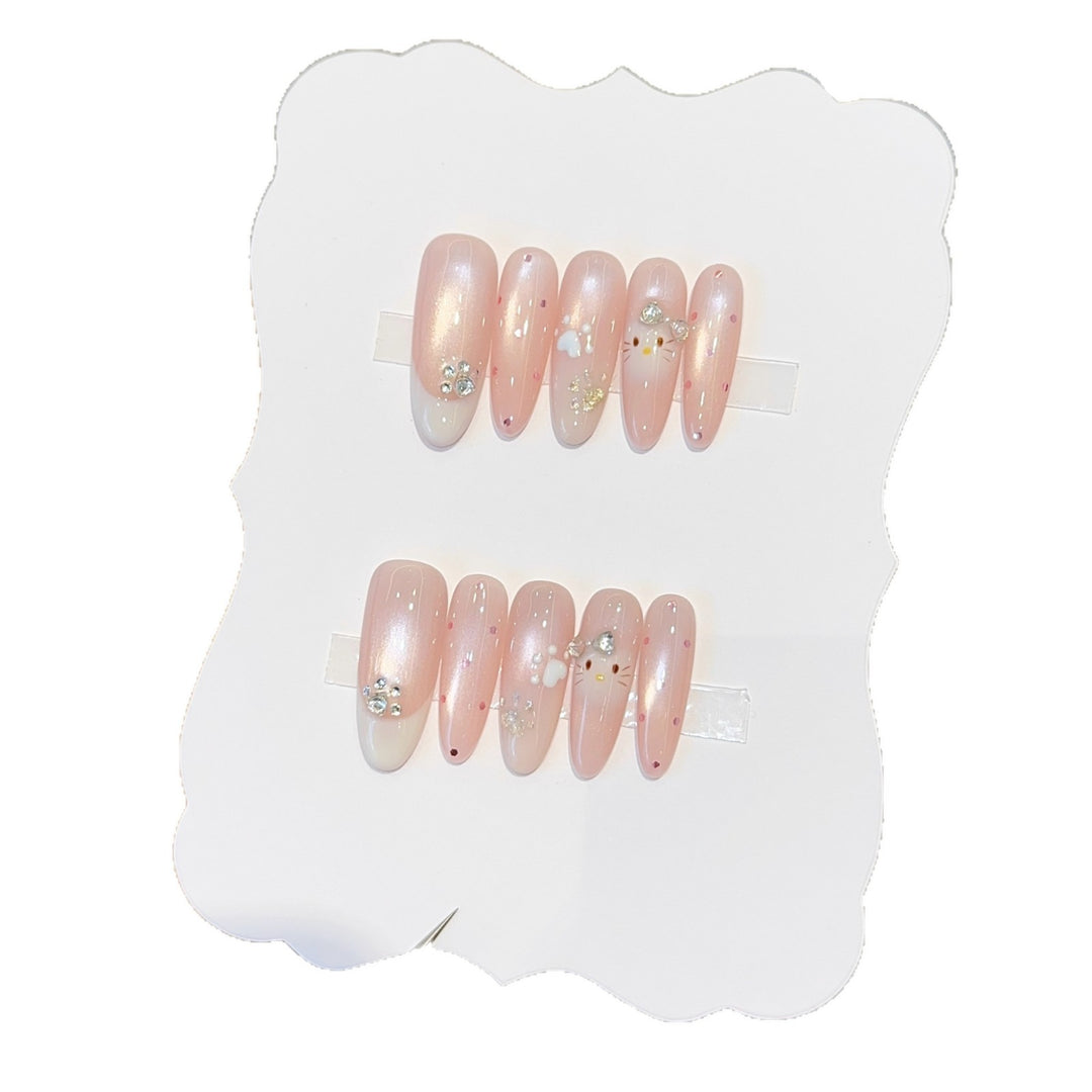 Artificial nail tips with playful penguin and paw print design Stornfield