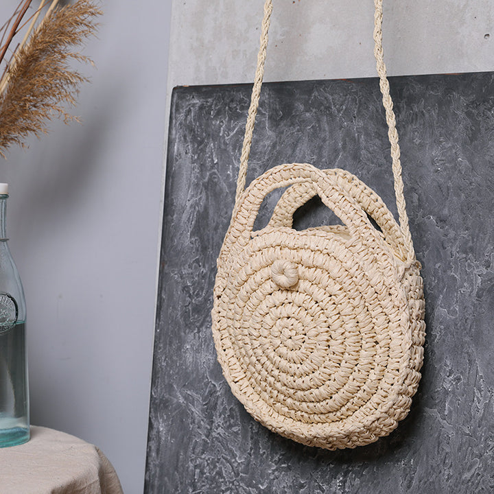 Handcrafted Round Wicker Bag with Elegant Closure Stornfield