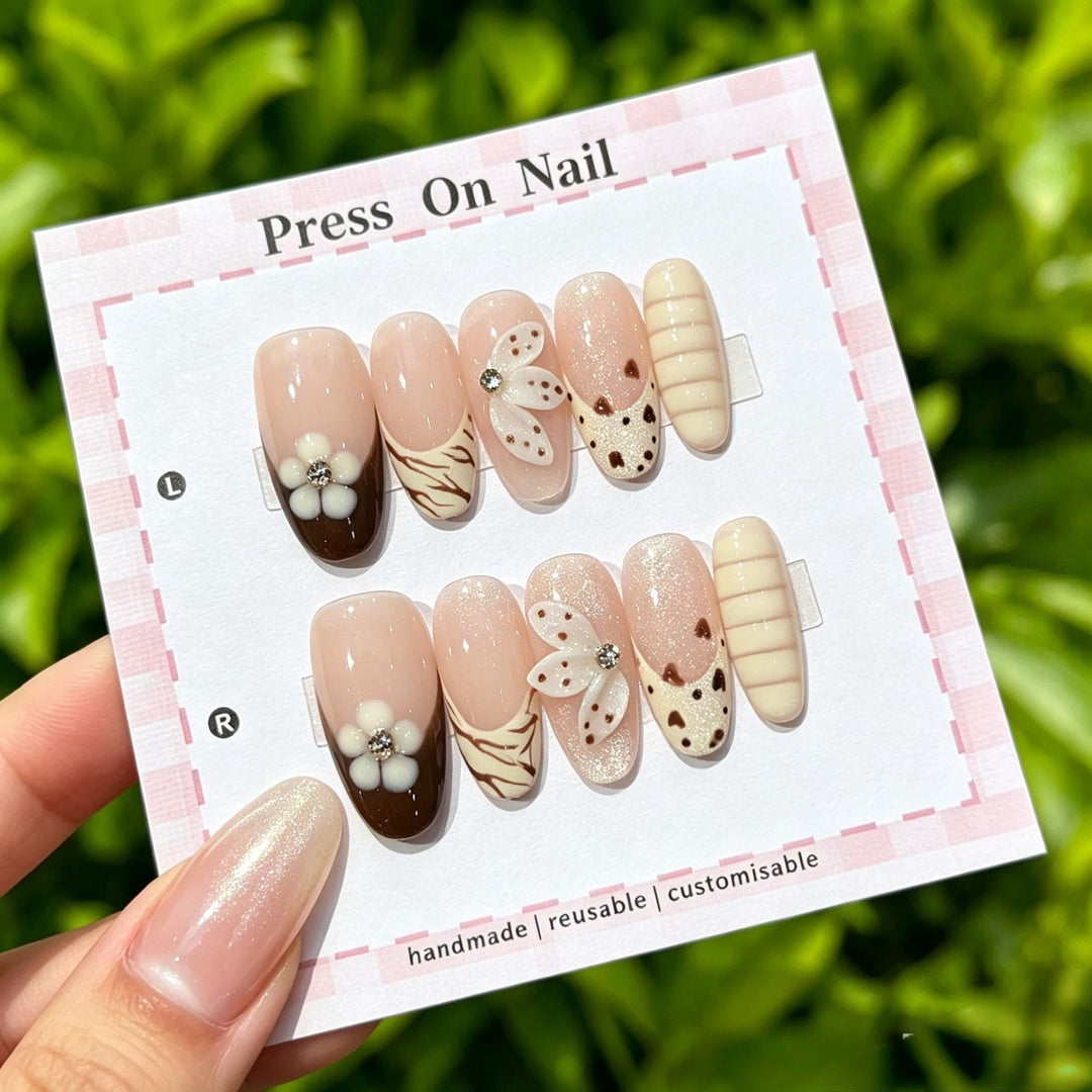 Artistic Press-On Nail Set with Floral and Patterned Designs