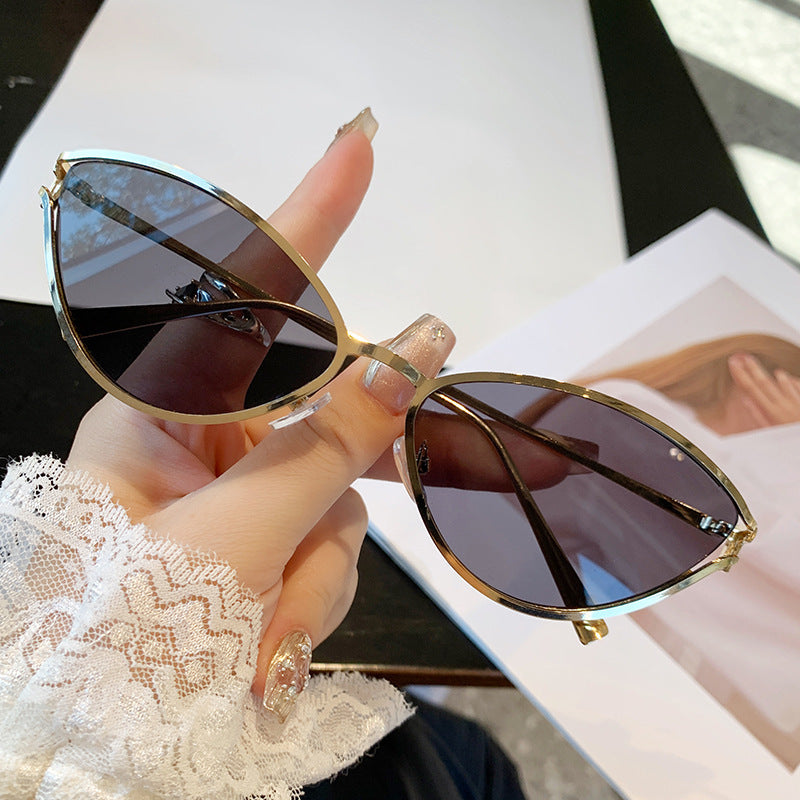 Ladies Cat-Eye Sunglasses with Elegant Metal Frame and UV Protection Stornfield