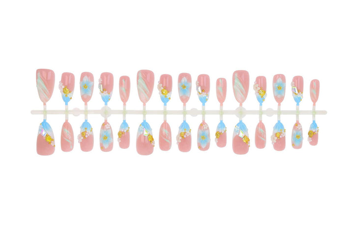 Artificial nail set with elaborate floral accents Stornfield