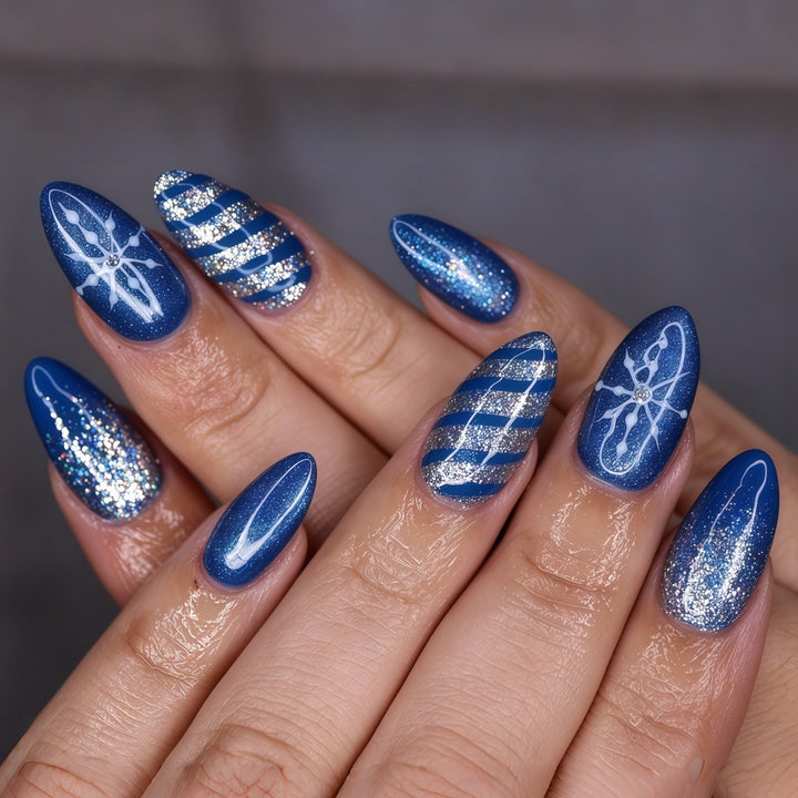 Glamorous artificial nails with glitter and pattern design Stornfield