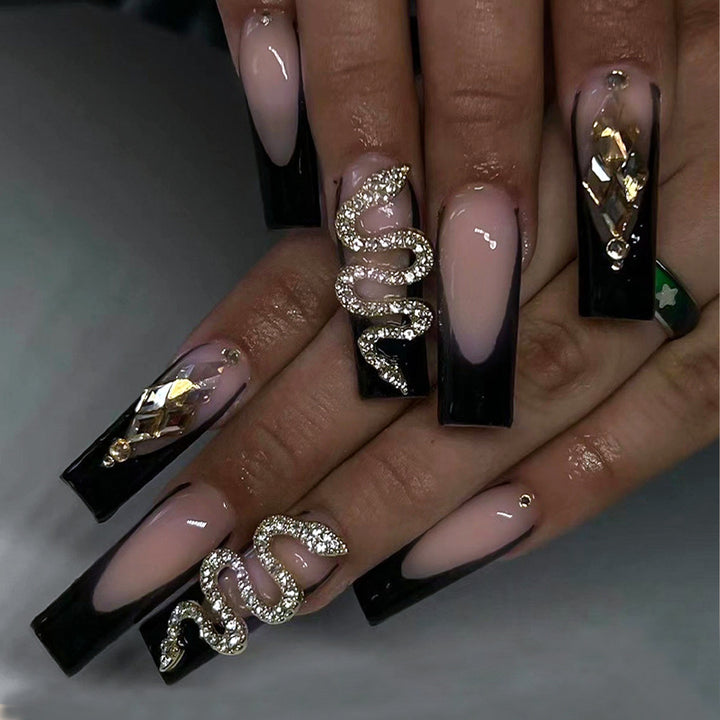 Artificial nail tips with glamorous snake design Stornfield