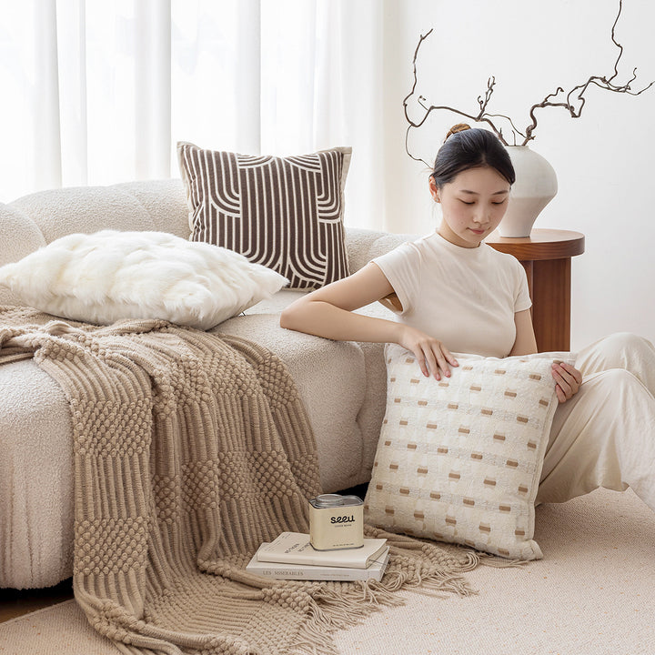 Decorative cushion with geometric pattern