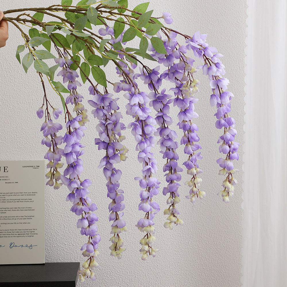 Artificial flower branch with elegant flowers