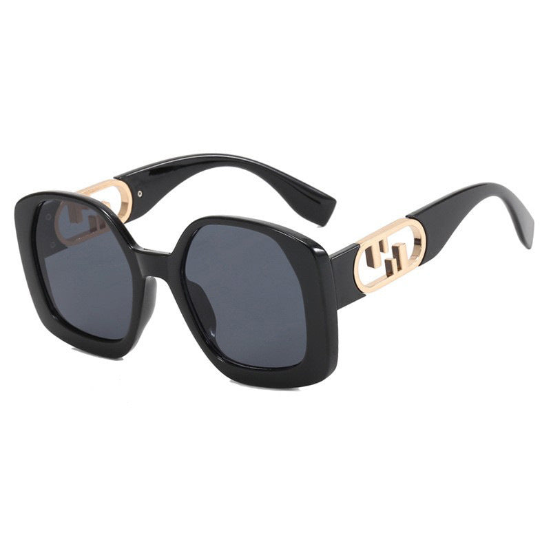 Women oversized sunglasses with extravagant geometric frame and elegant accents Stornfield