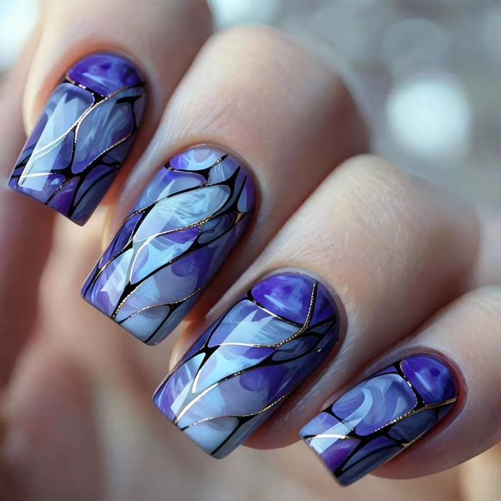 Acrylic nail set with luxurious marble design and elegant accents Stornfield